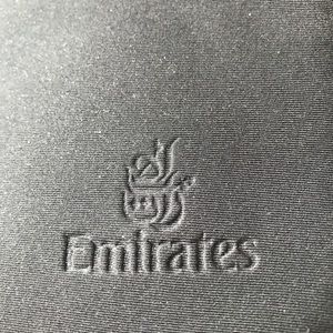 - Emirate Airline New Black Bag  2 zipper compartments

10” x 8”

emirates